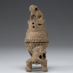 Front view of ceramic incense burner with two separate pieces.