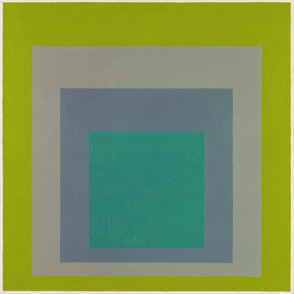 Un cuadro de cuatro cuadrados anidados. El cuadrado más interior es de color turquesa. Está rodeado por un cuadrado gris oscuro, que está rodeado por un cuadrado gris claro. El cuadrado gris claro está rodeado por un cuadrado verde lima.