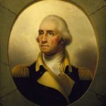 An oil painting of George Washington wearing a dark military uniform with a tan collar, lapels, and epaulets. The sky behind him is bright yellow and cloudy. His image is framed within an image of a cracked stone oval.