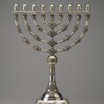 A silver Hanukkah menorah.