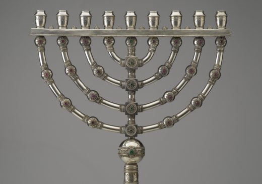 A silver Hanukkah menorah.