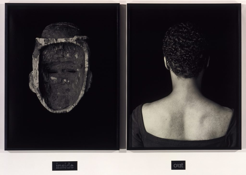 An image of two black-and-white, side-by-side photographs. The first photo shows the inside of an African mask, labeled with the word “inside.” The second photo shows the back of a woman’s head and upper back. It is labeled with the word “out.”