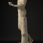 Statue of Bacchus without restored head or arm, side view.