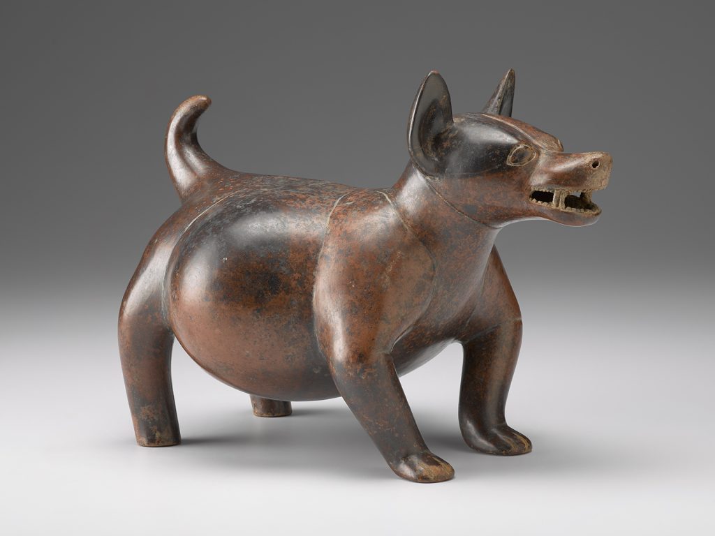 A ceramic sculpture of a dog.