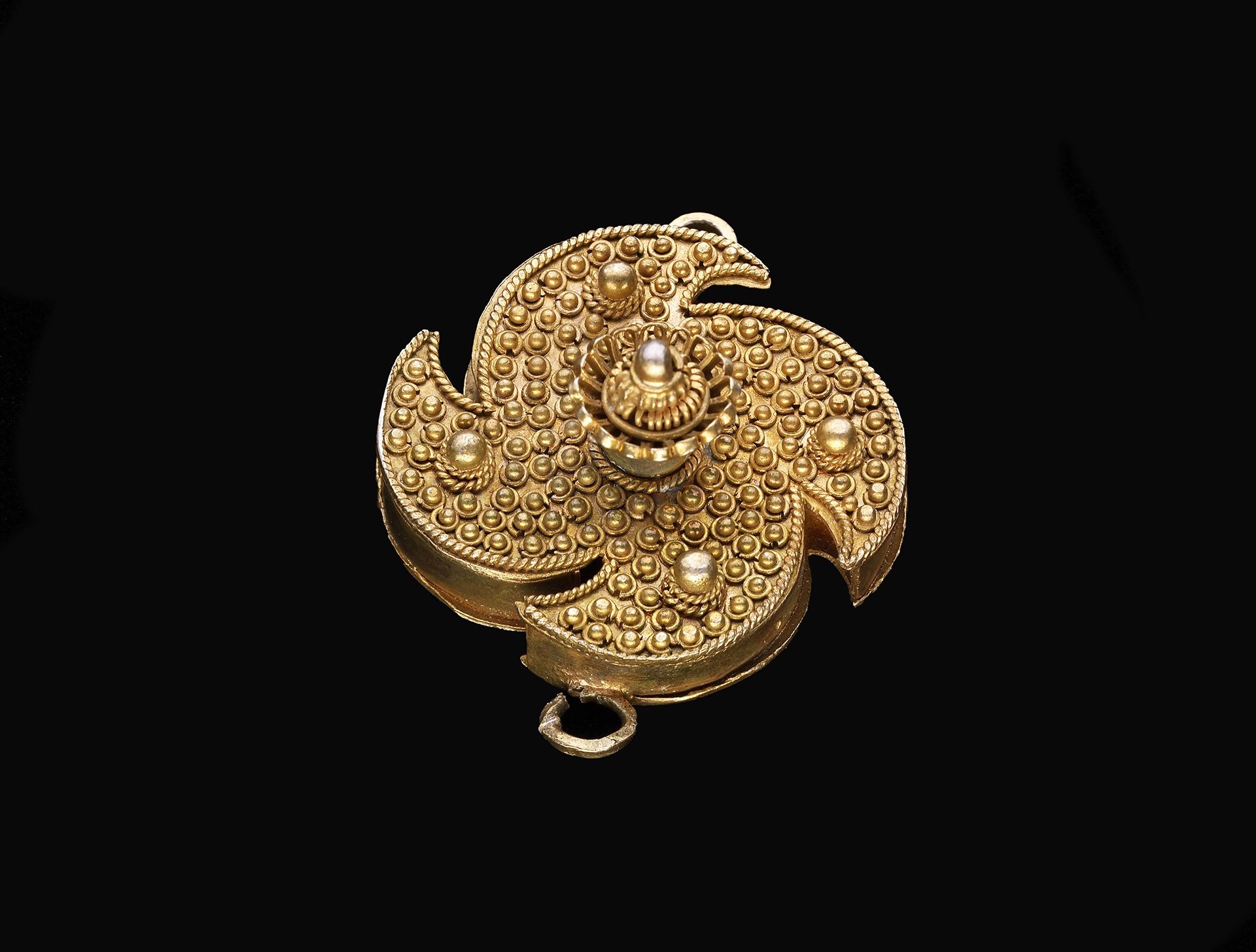 Ornament small gold disc shaped ornament with granules