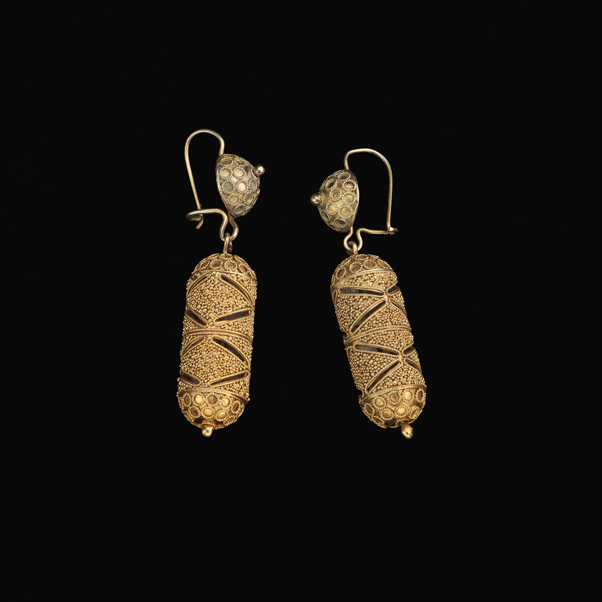 Earrings cylinder hollow earrings made of gold with intricate design