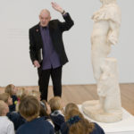 Docent with Statue of Helios