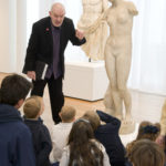 Docent with Aphrodite of Cyrene