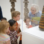 Docent and campers with Beaded Crown (Adé)