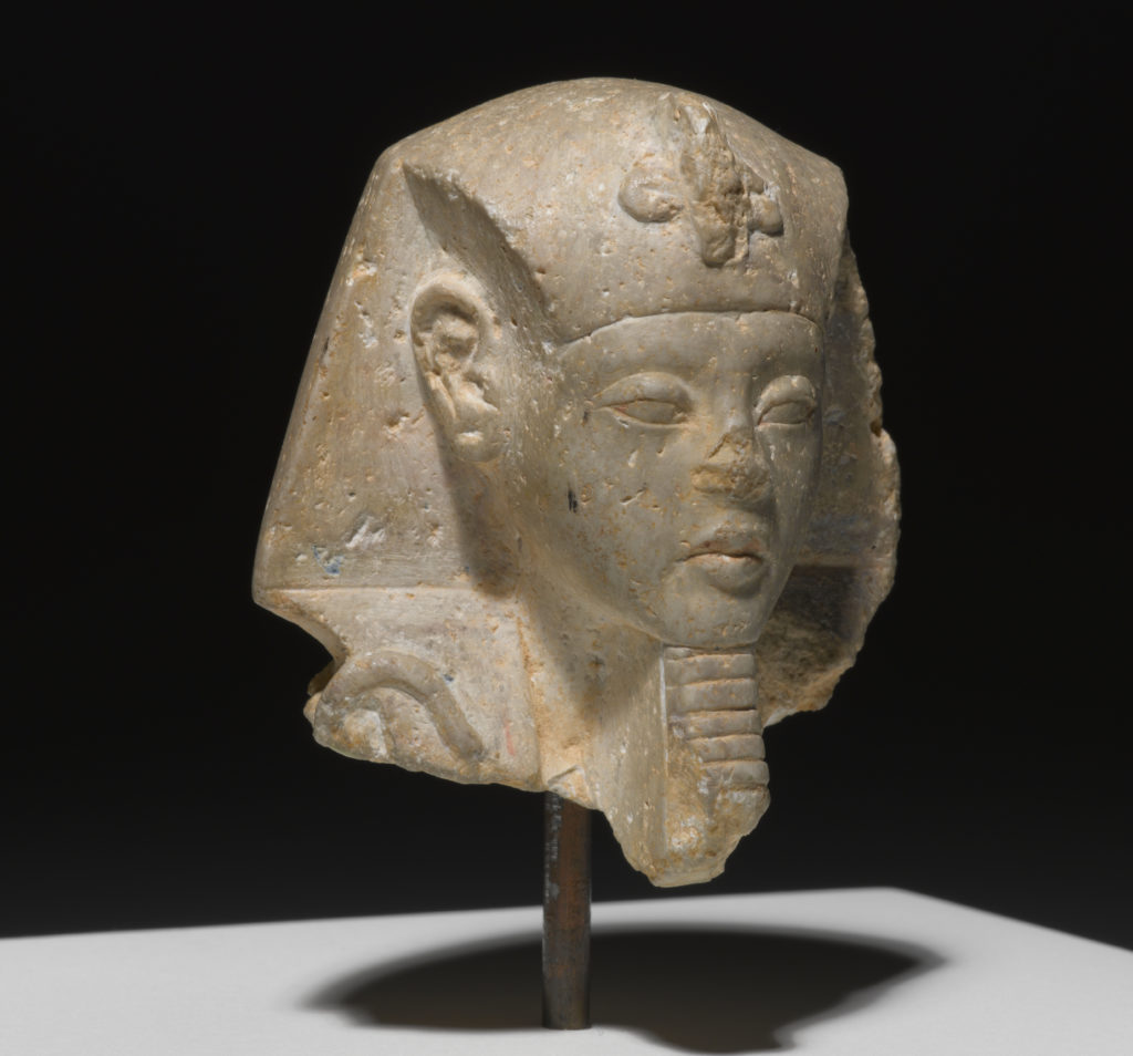 A head from a shabti, or small mummy sculpture.