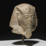 A head from a shabti, or small mummy sculpture. Alternate view.