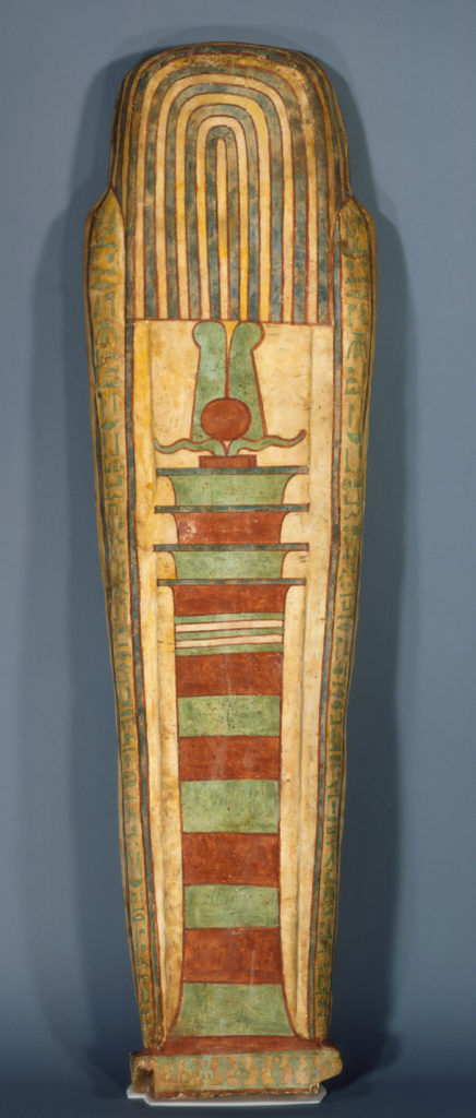 A wooden coffin shaped like a human body, with ancient Egyptian symbols and deities painted on its surface.