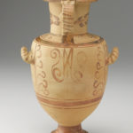 A painted ceramic vase decorated with leafy, ornamental patterns and two animal scenes. One scene depicts a wild goat and a hunting dog, and the other depicts two water birds. View of reverse.