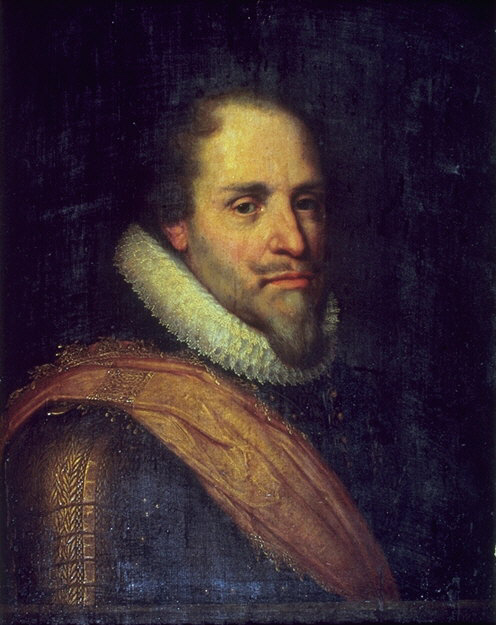 An oil painting of a bearded man dressed in armor, posing in front of a dark background. He is wearing a pink sash over his shoulder and a white, frilly collar around his neck.
