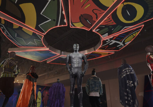 Installation view of exhibition featuring costumes from Black Panther