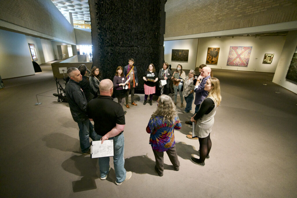 A group of teachers in the galleries