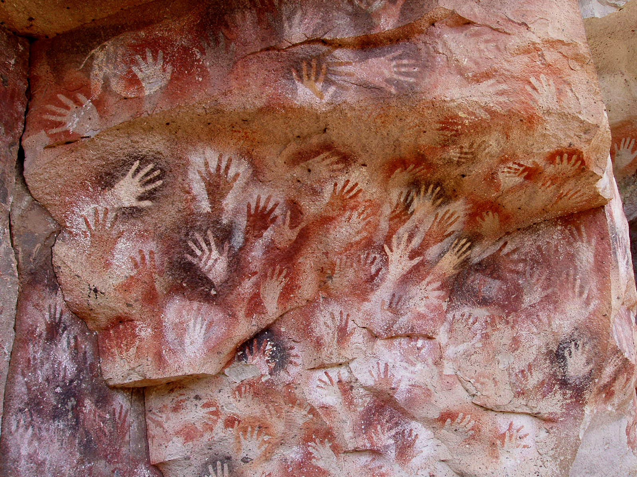 Hands at the Cuevas de las Manos upon Río Pinturas, near the town of Perito Moreno in Santa Cruz Province, Argentina. Photo Credit: Mariano Cecowski Hands at the Cuevas de las Manos upon Río Pinturas, near the town of Perito Moreno in Santa Cruz Province, Argentina. Photo Credit: Mariano Cecowski