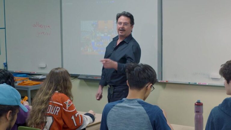 Peter Marin teaches students at Raleigh Charter School about Día de los Muertos