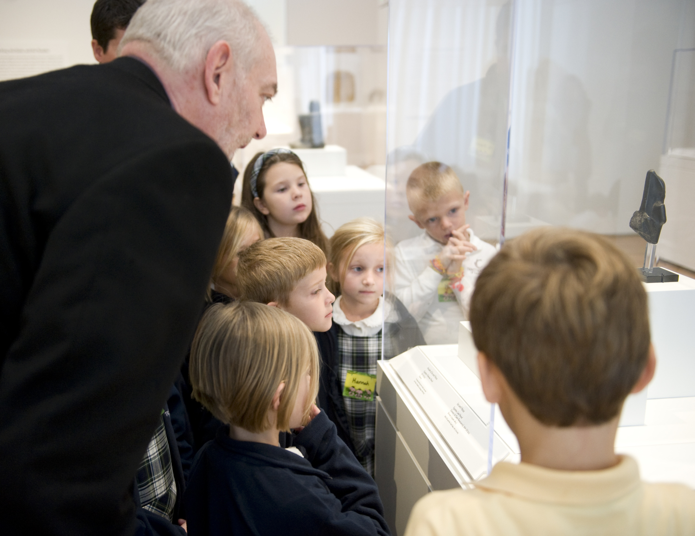 James Durnin is the docent. Docent James Durnin leads a tour of school children