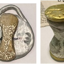 Two small clay sculptures painted gold