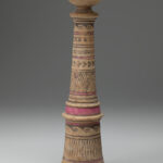 Beige ceramic cylindrical incense burner with a flared base topped with a broad-lipped bowl