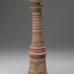 Beige ceramic cylindrical incense burner with a flared base topped with a broad-lipped bowl