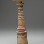 Beige ceramic cylindrical incense burner with a flared base topped with a broad-lipped bowl