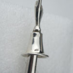 A detail image of a Silver Torah pointer featuring a tiny pointing hand