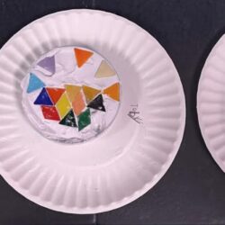 Three paper plates holding small, colorful mosaics